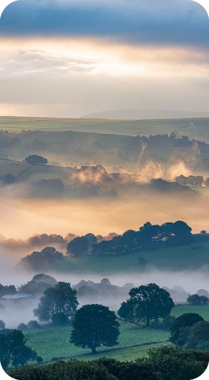 A stunning sunrise on a misty and foggy morning around the valleys of Whaley Bridge and Chapel-en-le-Frith in Derbyshire. UK